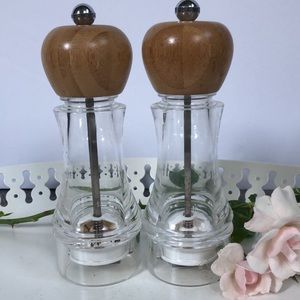 The Pampered Chef acrylic and bamboo top salt and pepper shakers.